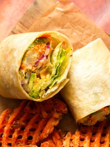 featured image of the buffalo cauliflower wrap sliced in half
