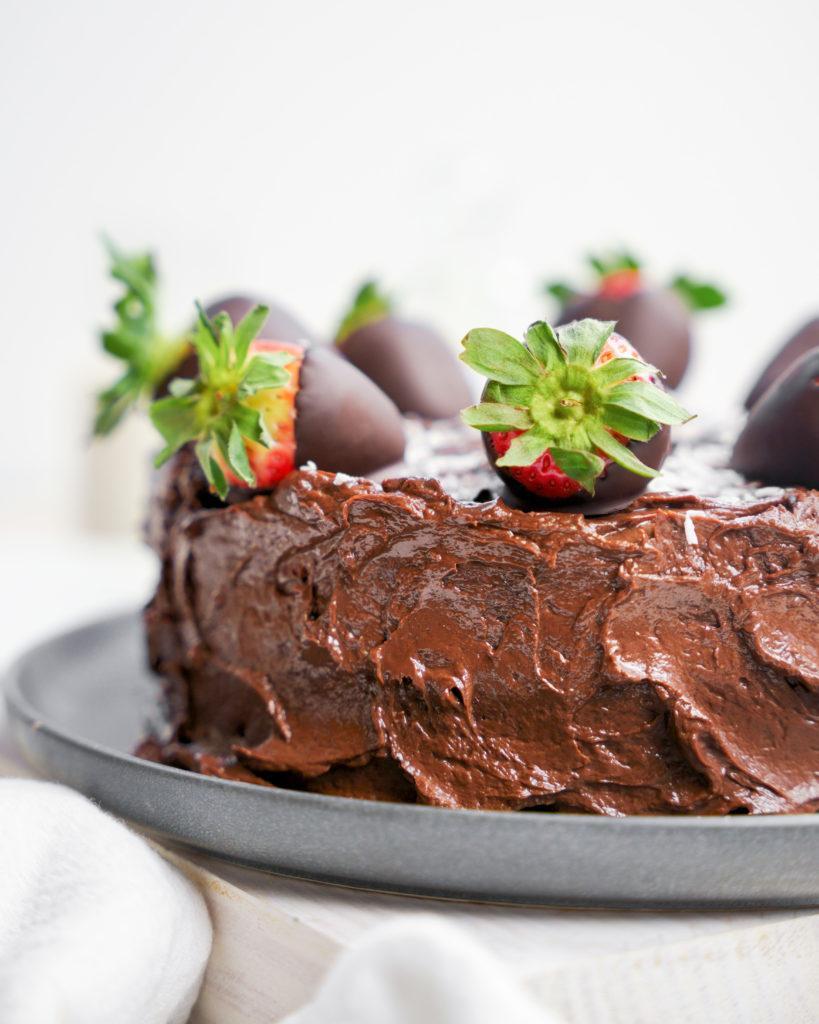 close up of the vegan healthy chocolate cake to show the creamy texture of the frosting