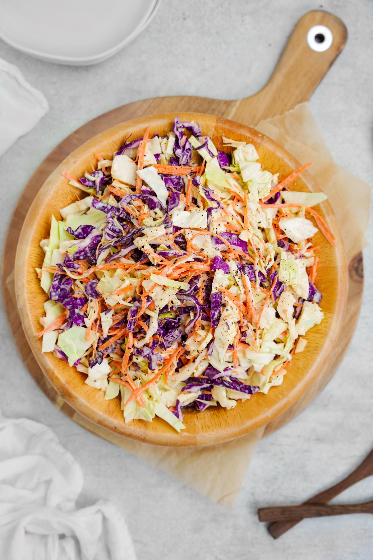 the healthy vegan coleslaw tossed with dairy-free coleslaw dressing
