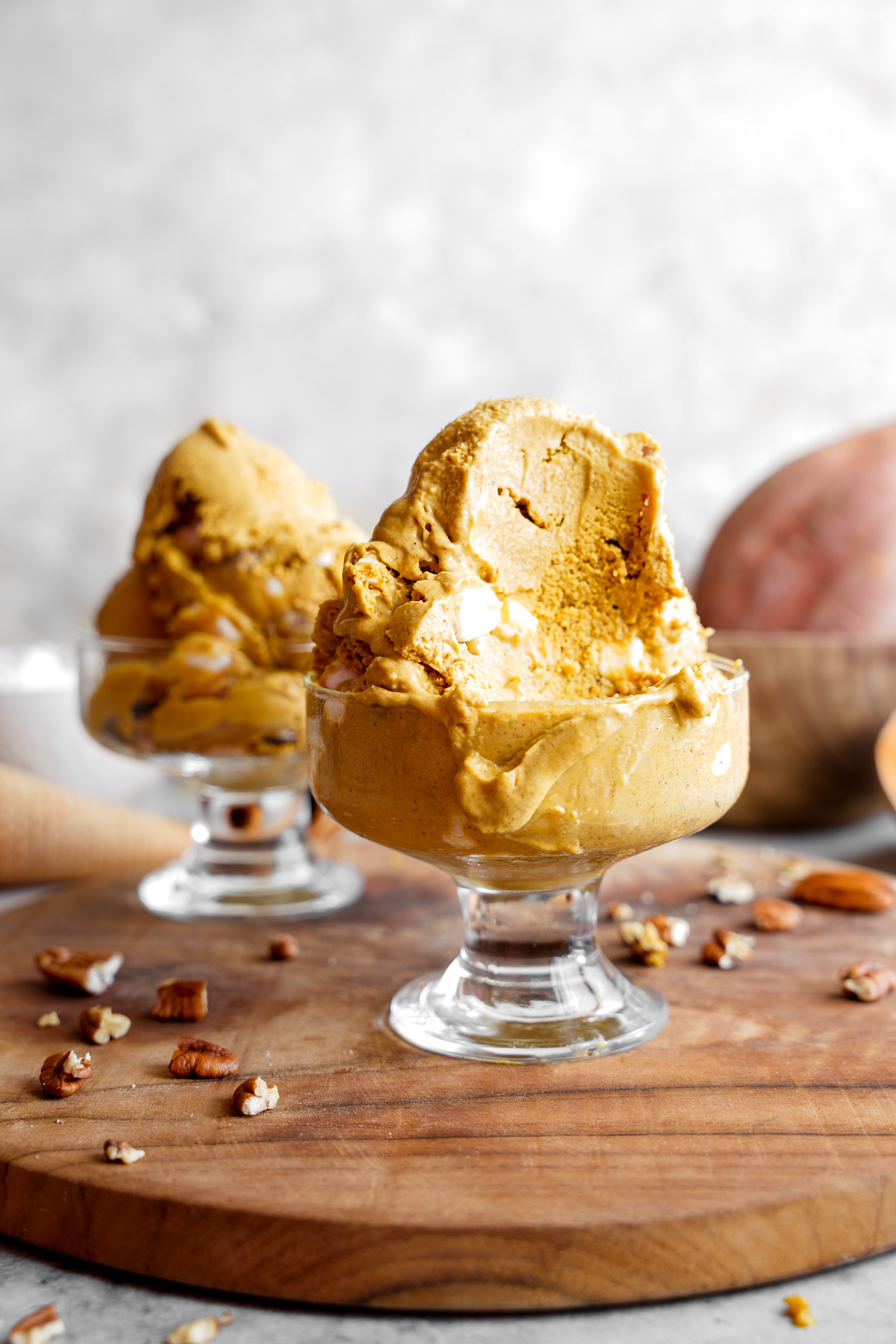 the ice cream with a scoop scooped out to show the creamy texture