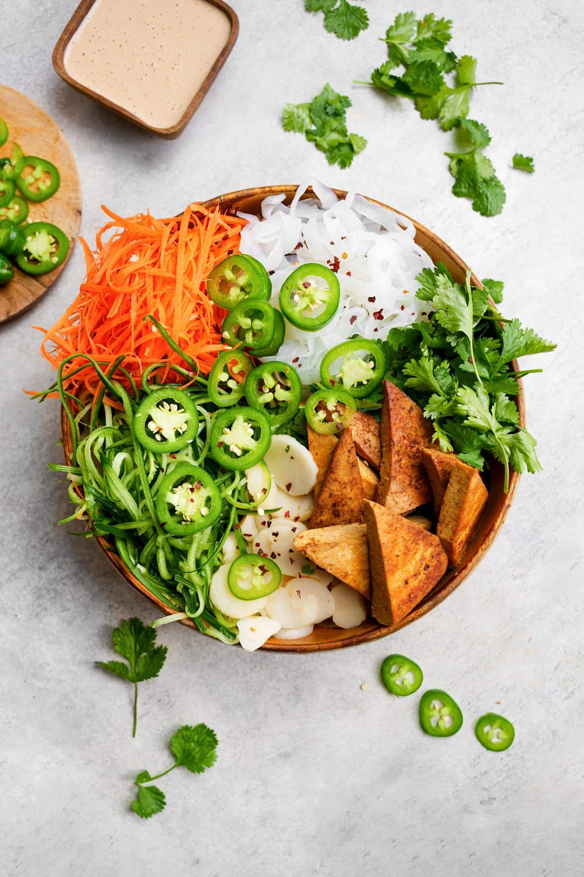 the banh mi noodles in a salad bowl without the dressing