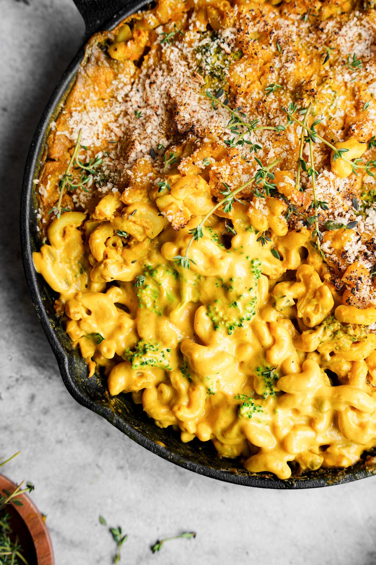 close up of the nut free mac and cheese to show the creamy texture underneath the crispy top