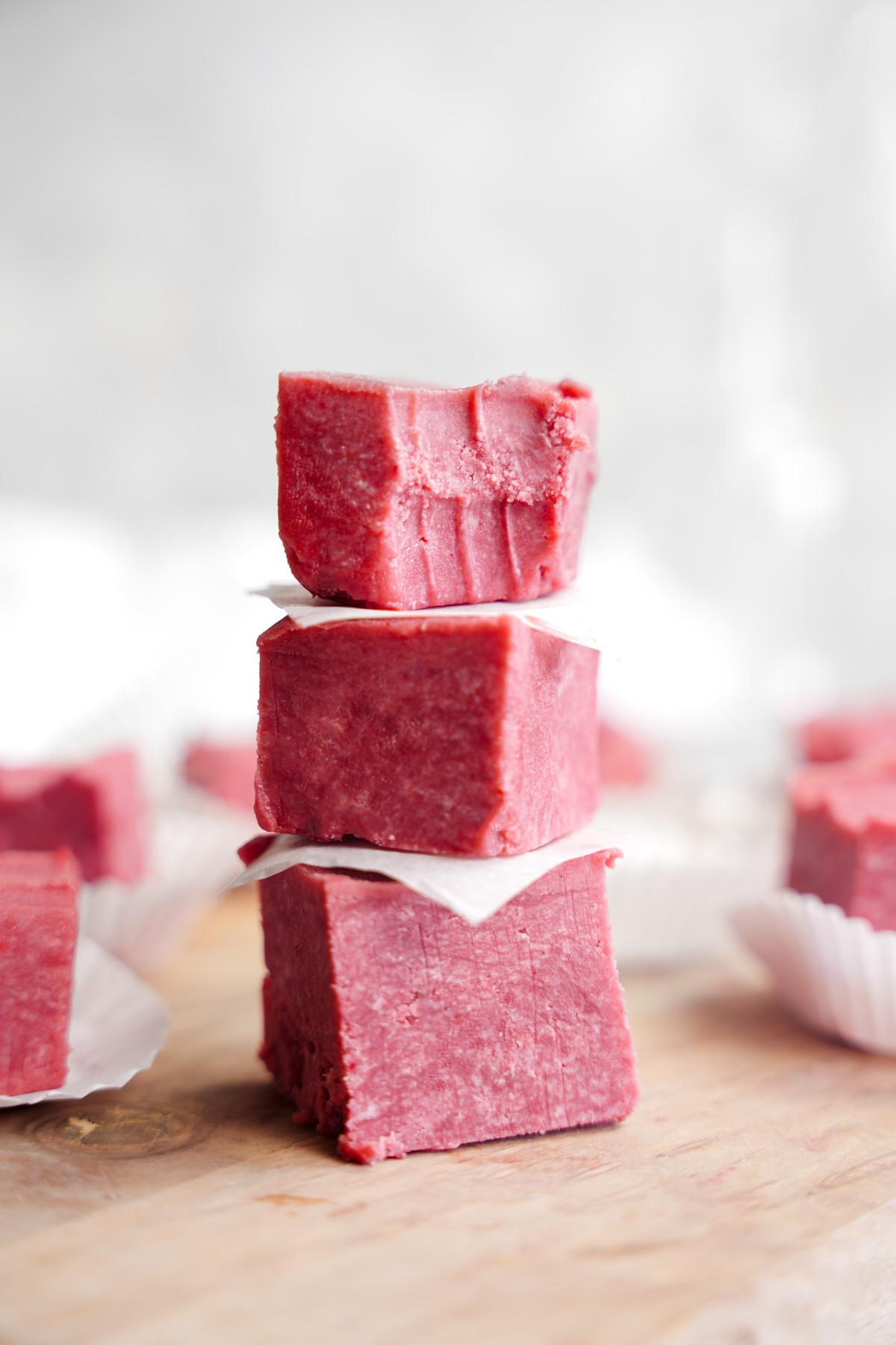 close up of the red velvet fudge stacked on top of each other