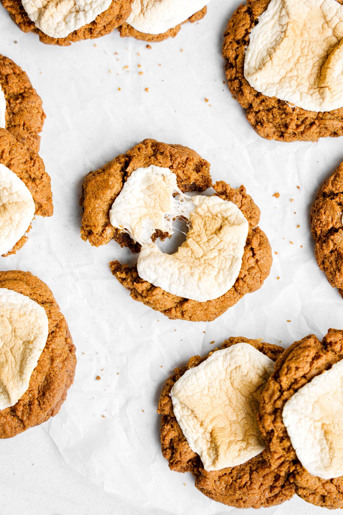 the peanut butter marshmallow cookies broken in half to show the gooey marshmallow filling