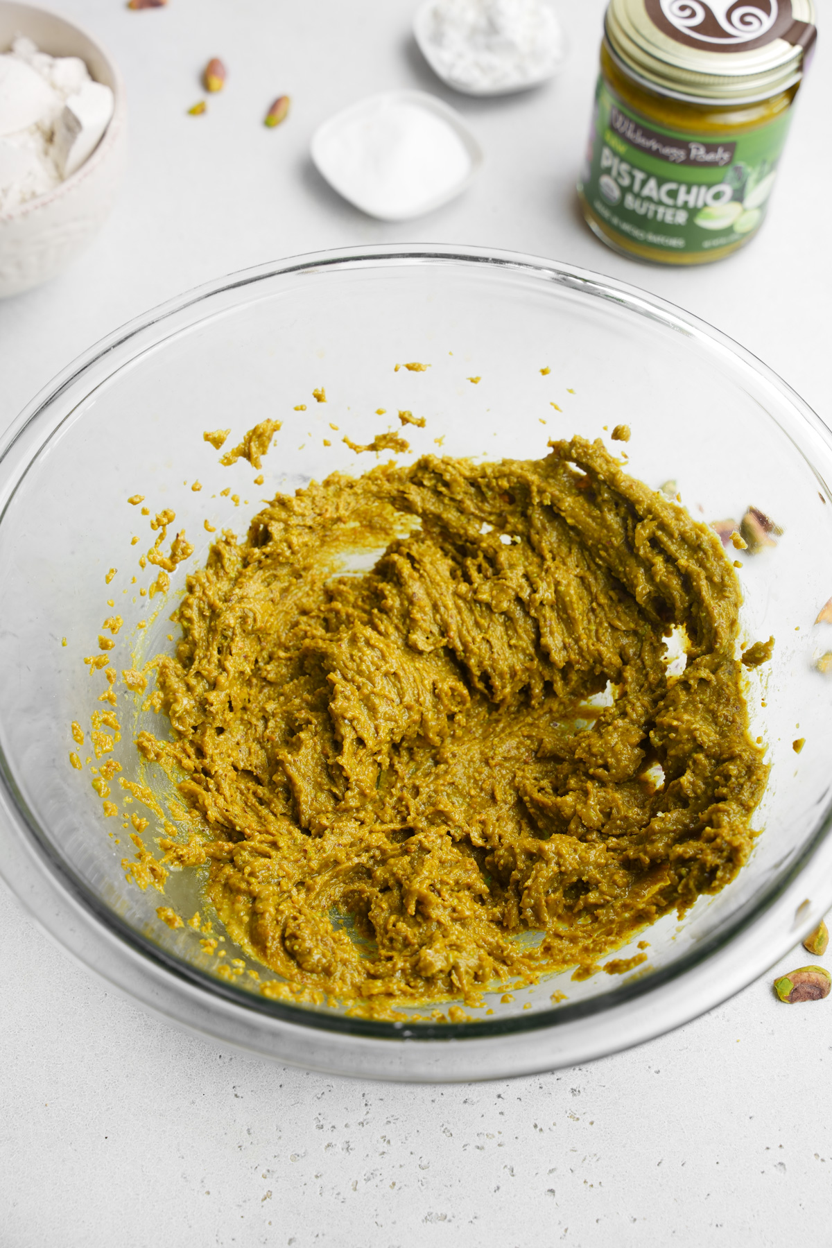 mixing the nut butters and vanilla extracts together in a large bowl
