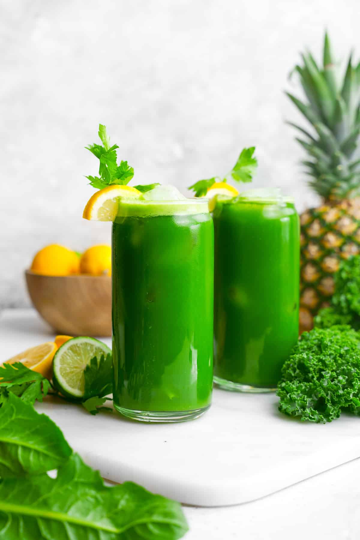 the dandelion juice served over ice with kale pineapple lemons and limes