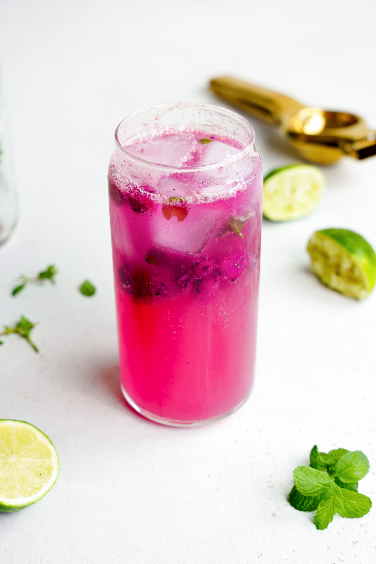 adding the ice and frozen dragonfruit