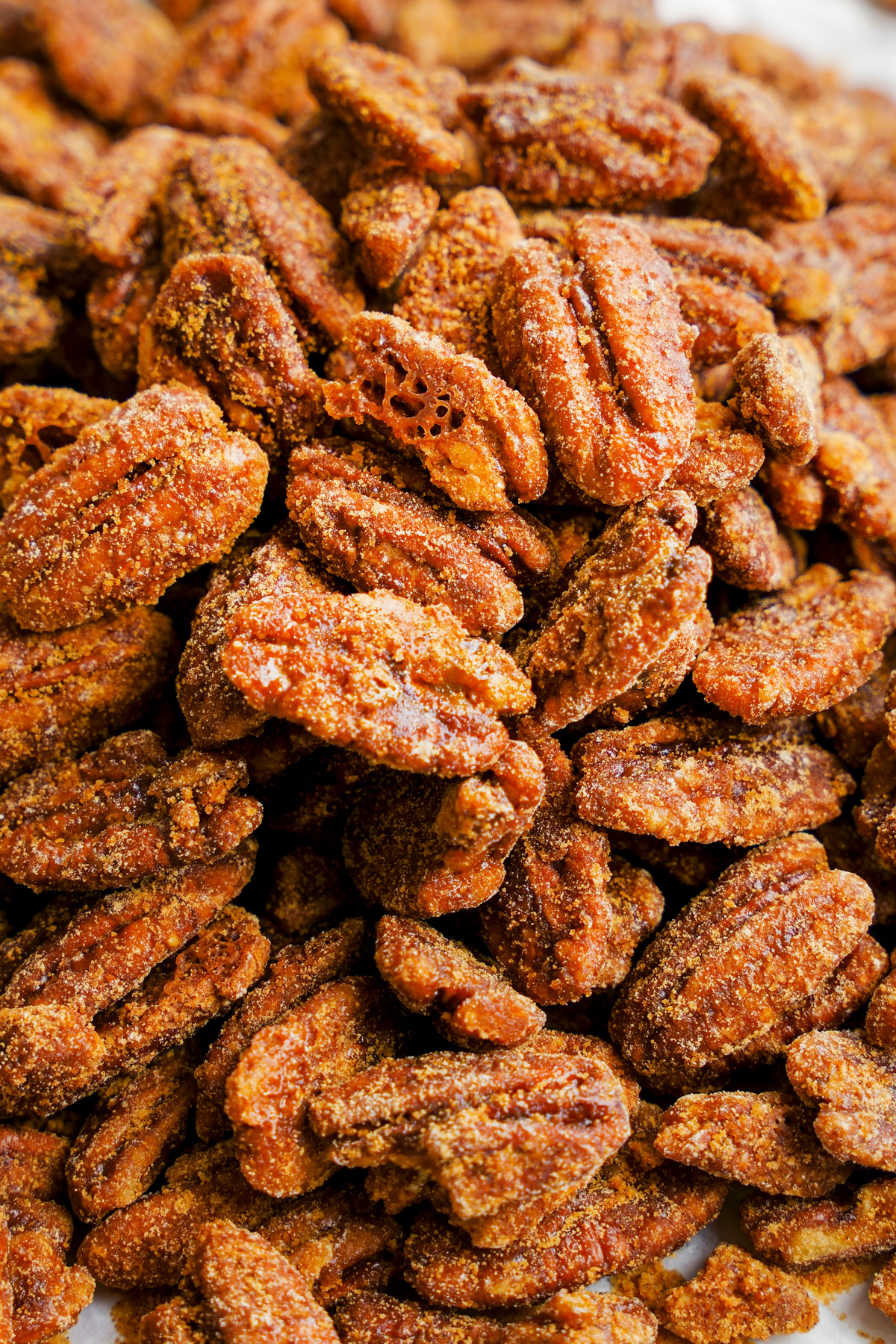 close up of the healthy candied pecans to show the crunchy texture