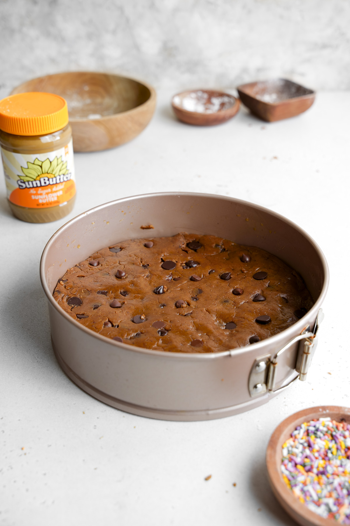 step five - the cookie dough pressed into the springform pan