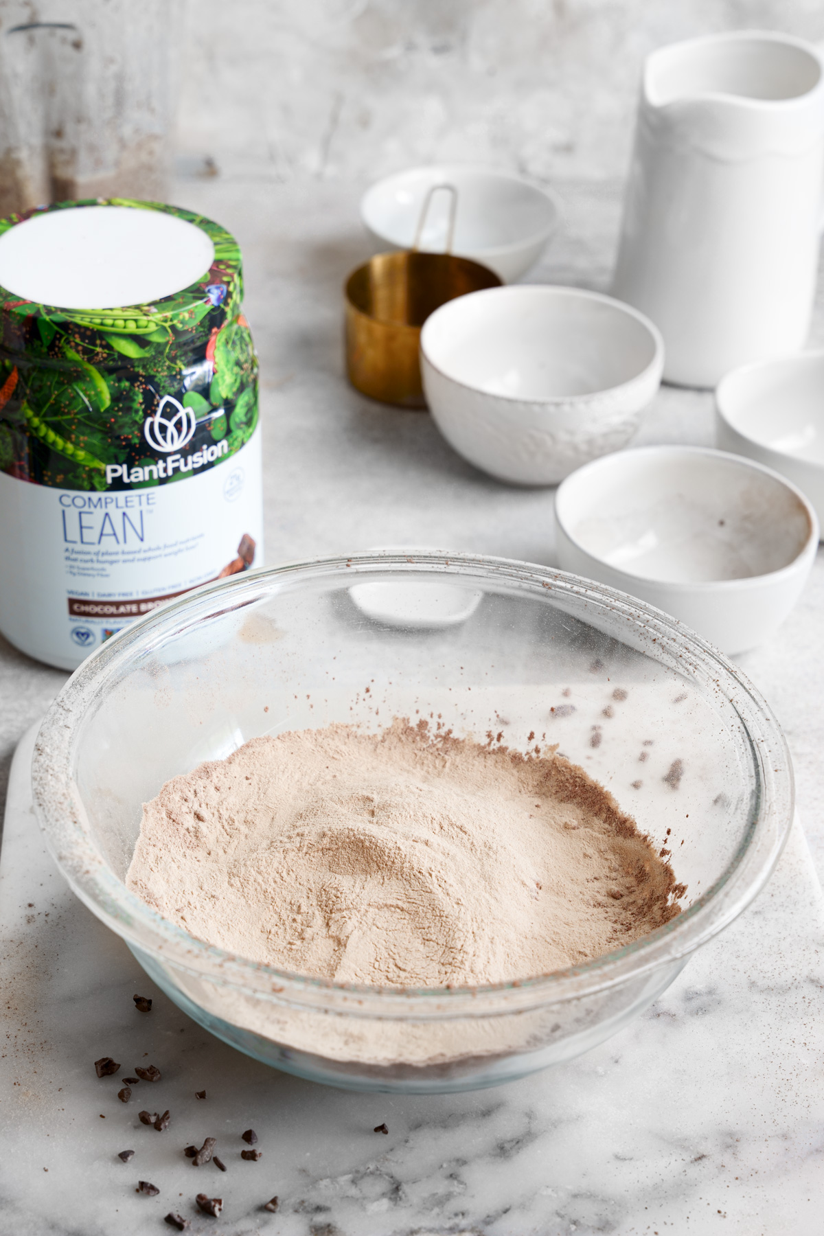the second step of making the brownies by combining all the ingredients together in a large mixing bowl