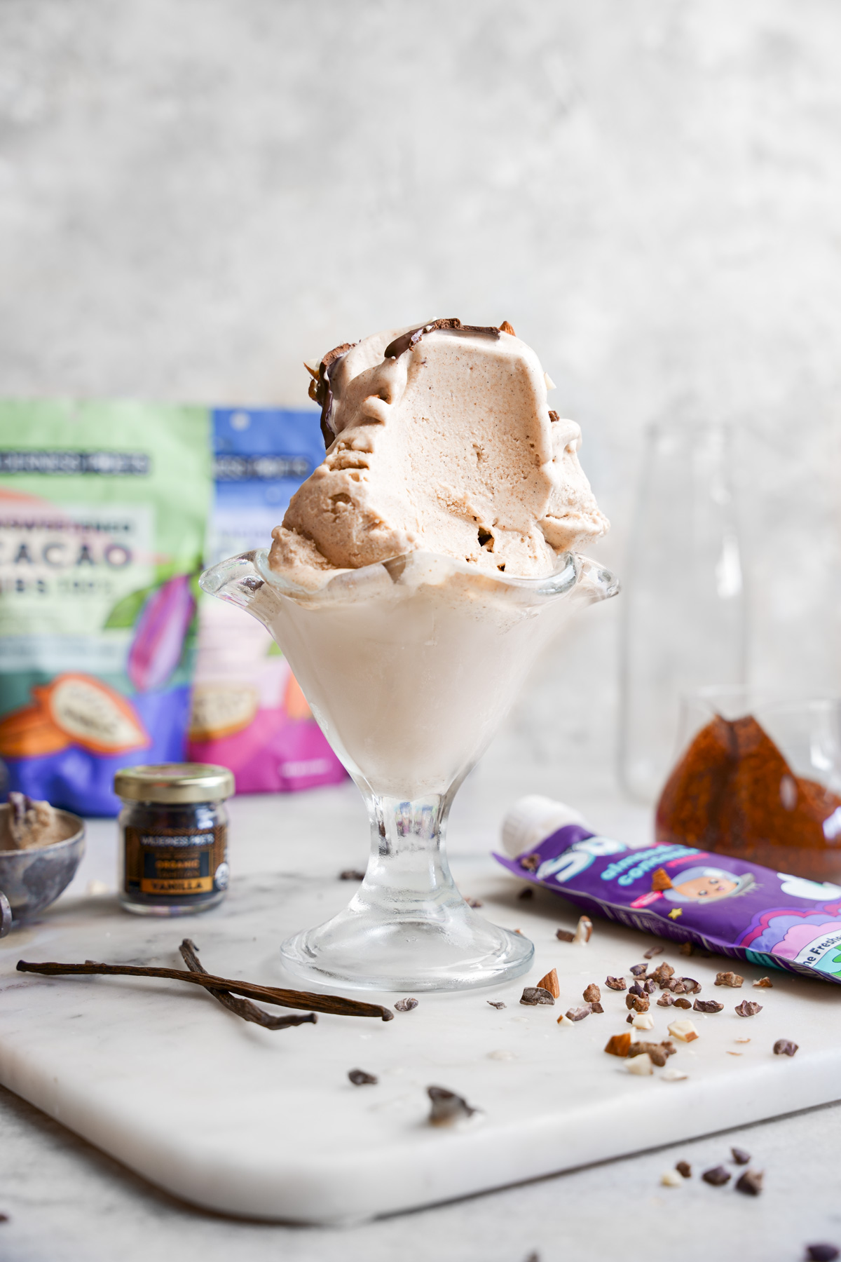 the vanilla ice cream with a scoop taken out of it to show the creamy texture