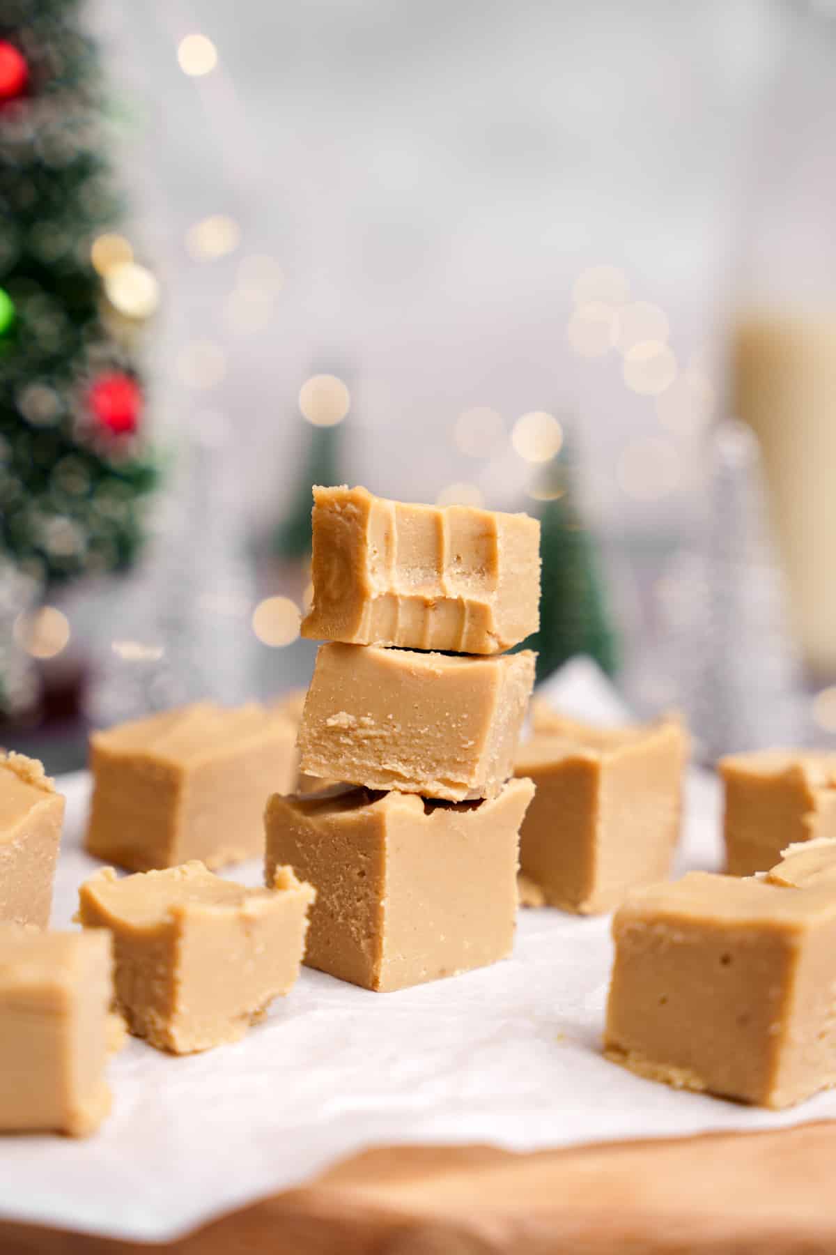a close up of the vegan fudge recipe with a bite taken out of the top one