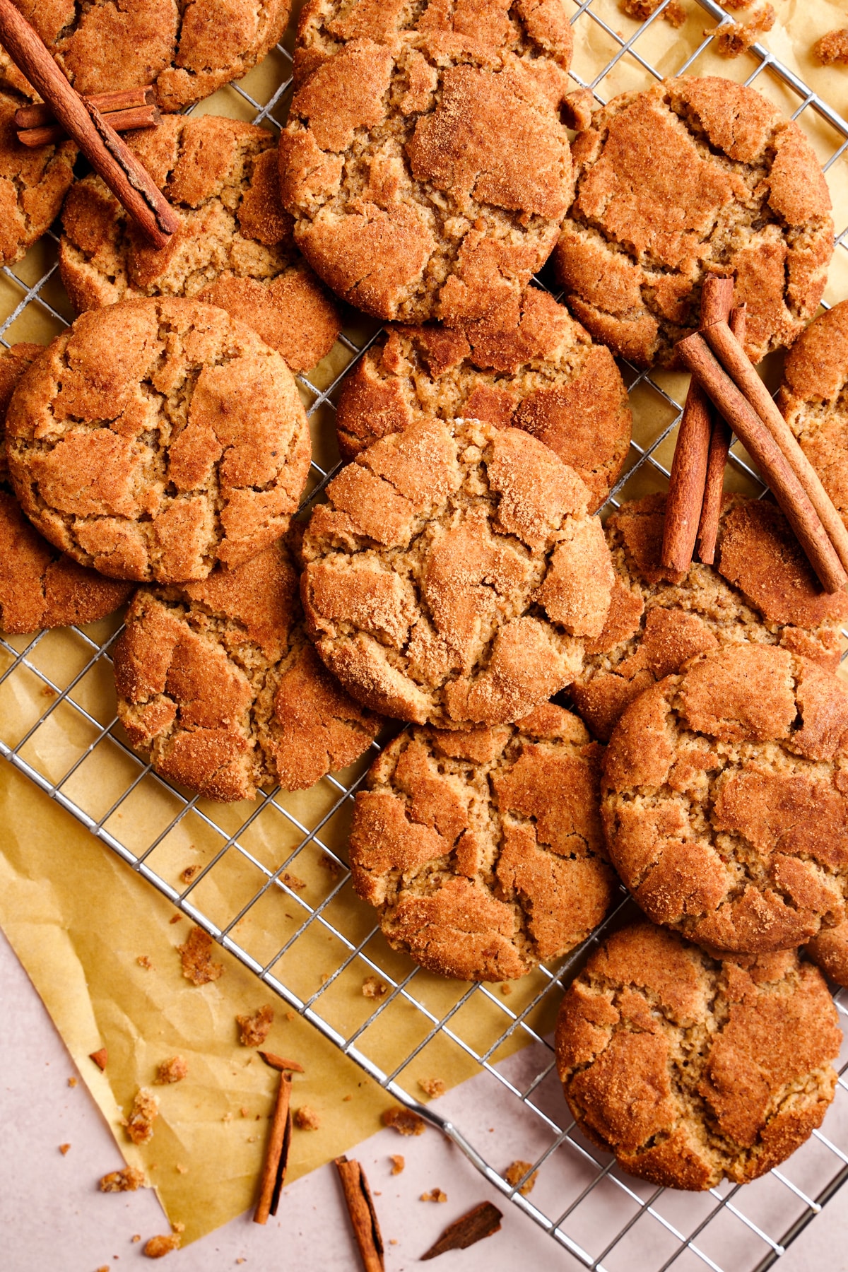 looking down at a cooling rack of vegan snickerdoodle cookies