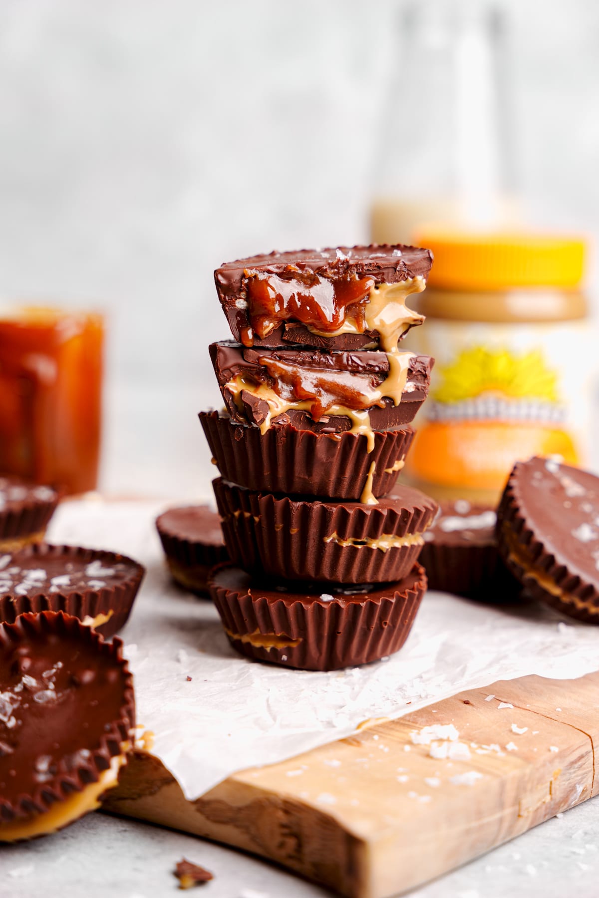 the sunbutter cups stacked n top of each other with caramel and sunbutter oozing out of it