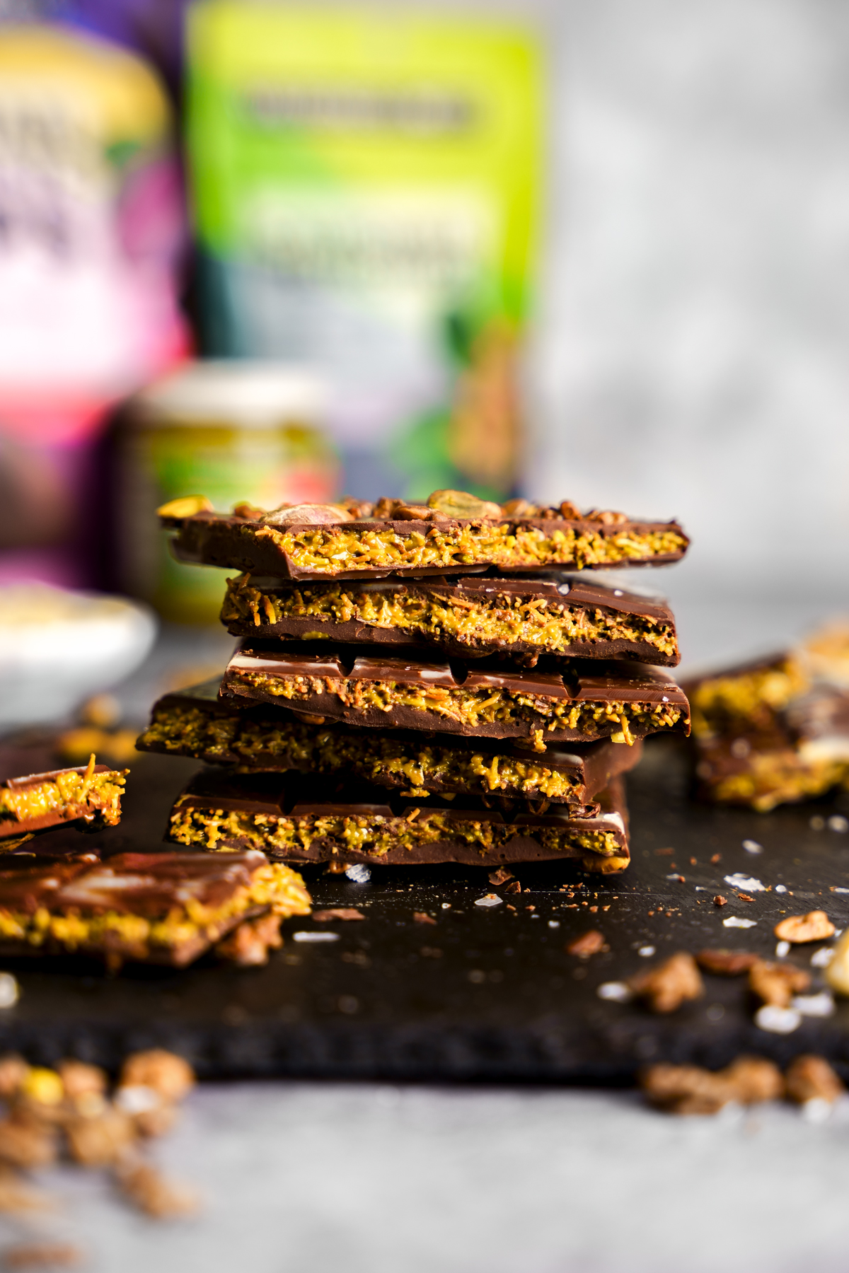 the dubai chocolate bar pieces stacked on top of each other to show the pistachio layer