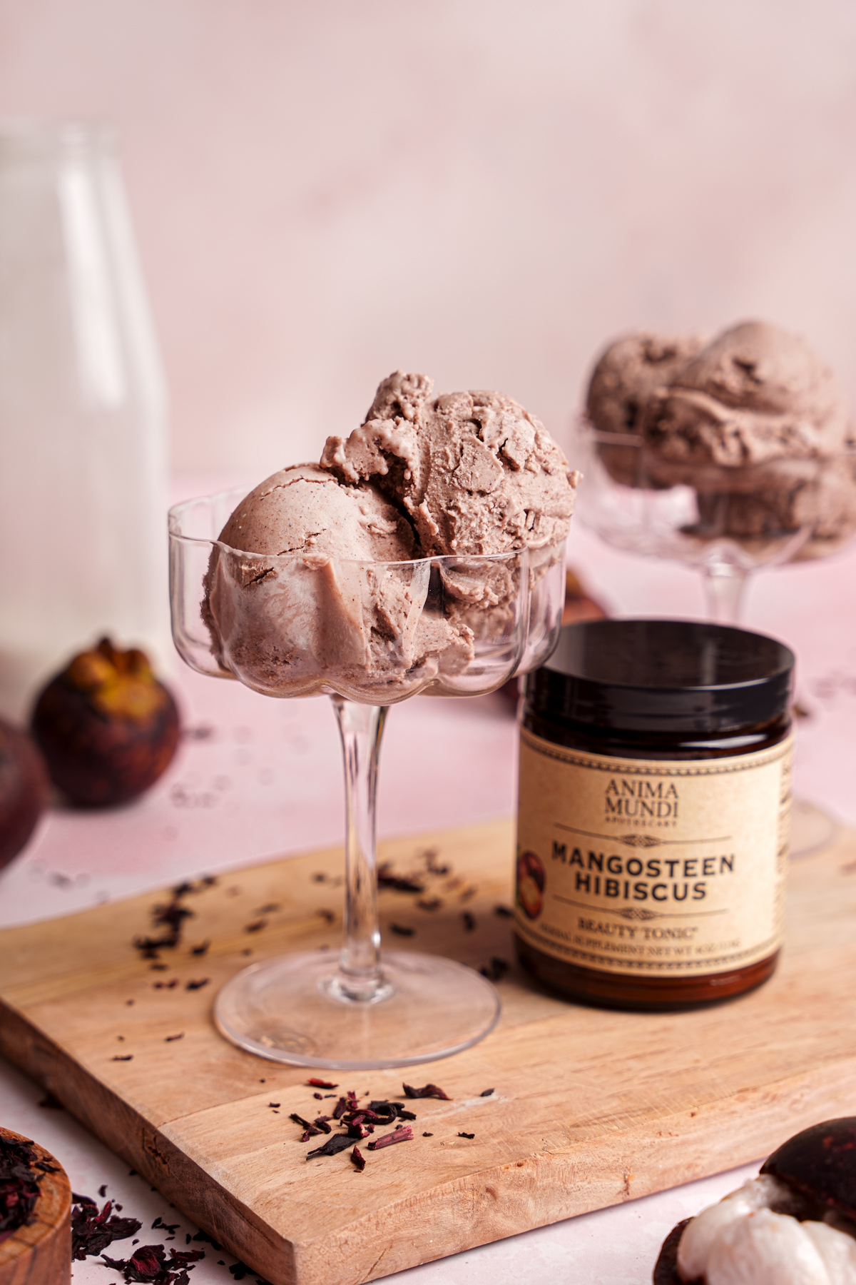 the vegan hibiscus ice cream with the anima mundi beauty tonic next to it