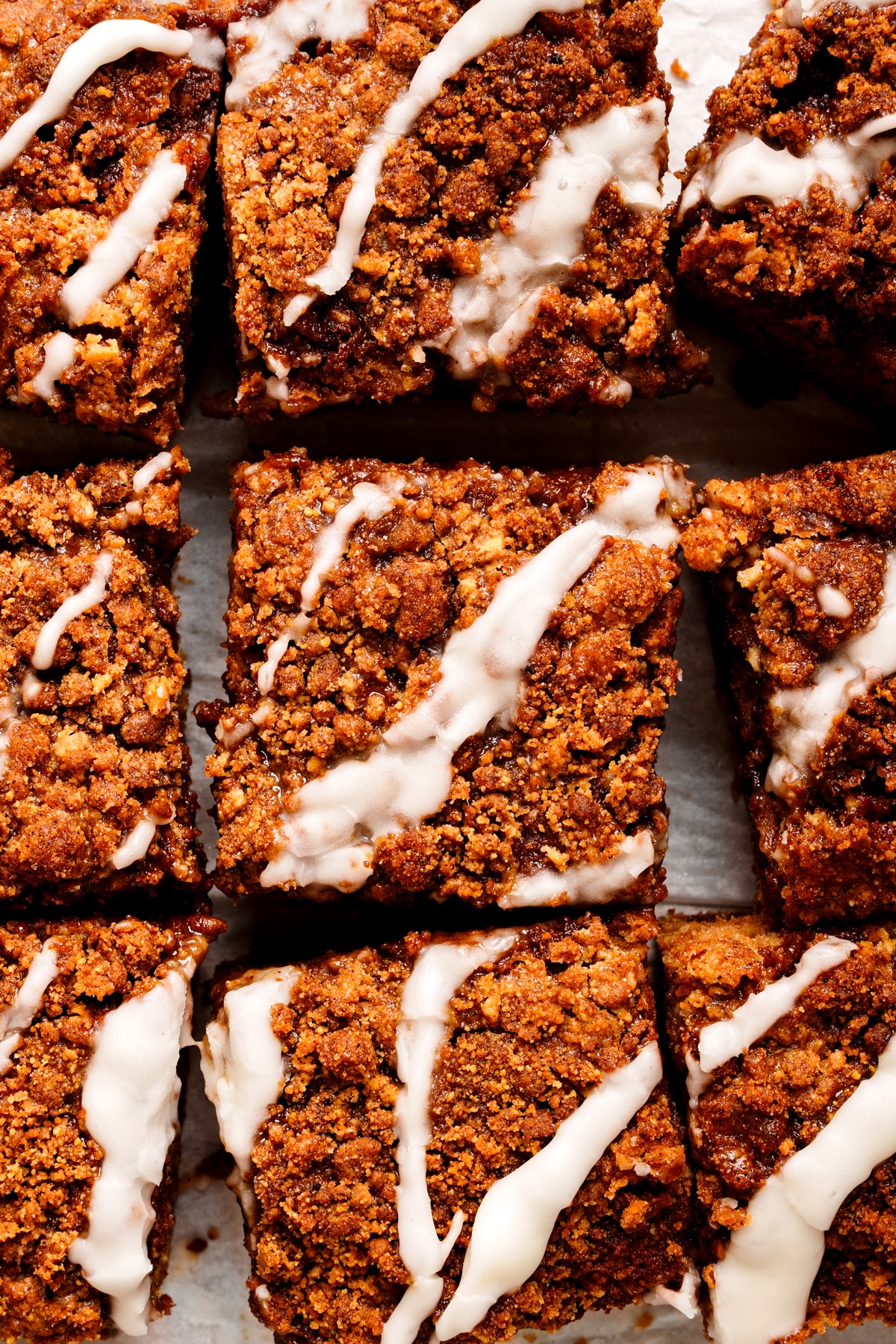 looking down at the slices of the healthy coffee cake with the streusel warmed on top