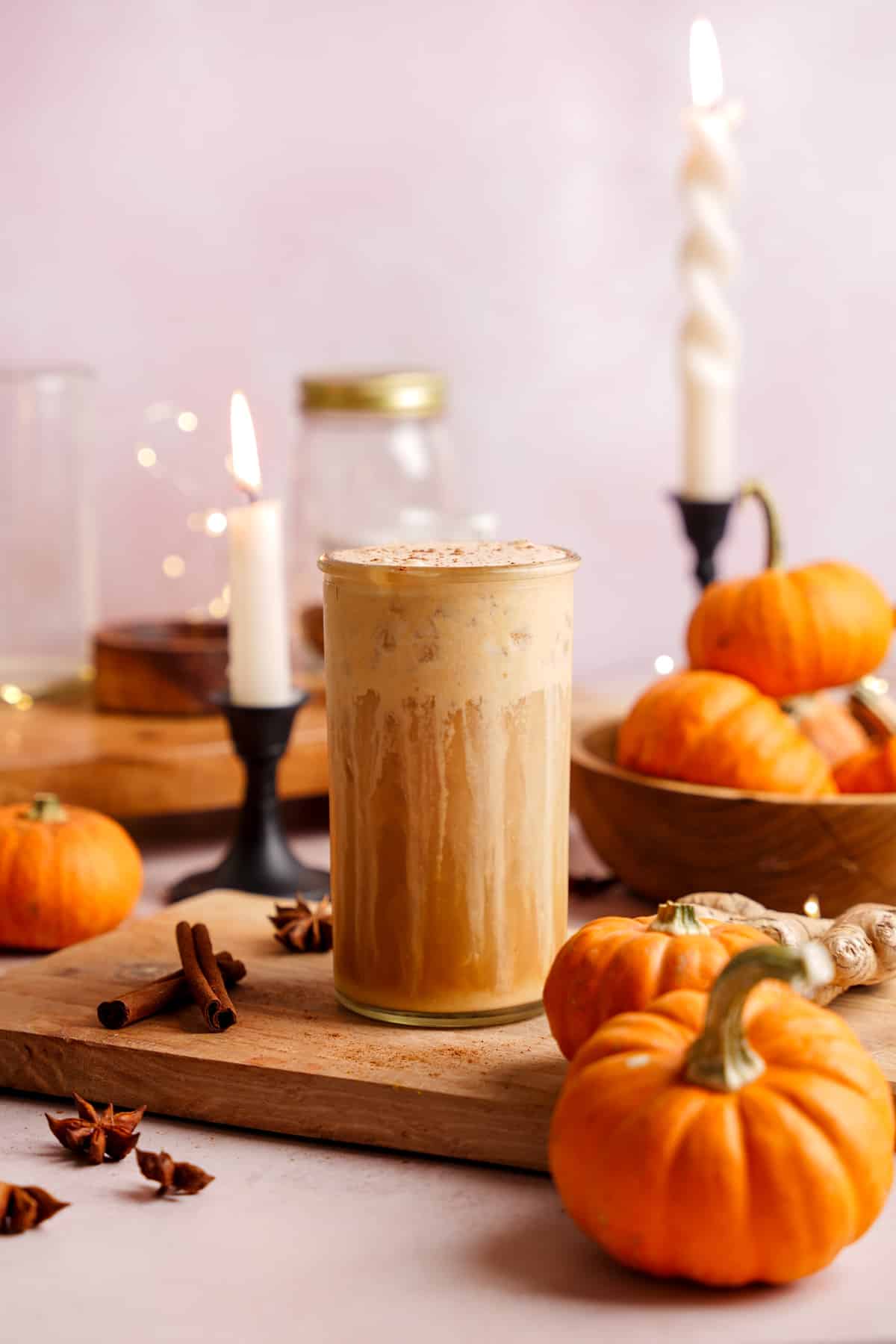 the iced pumpkin cream chai latte with the pumpkin cream dripping down