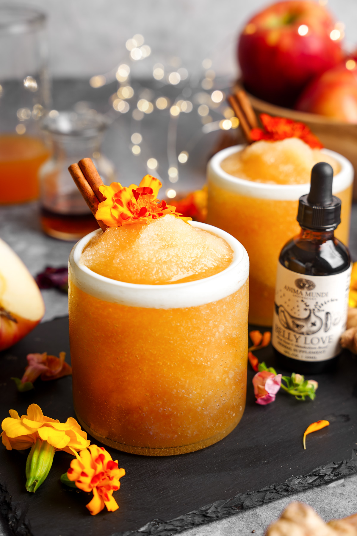 a close up of the apple cider mocktail to show the smooth and slushy like texture of the mocktail