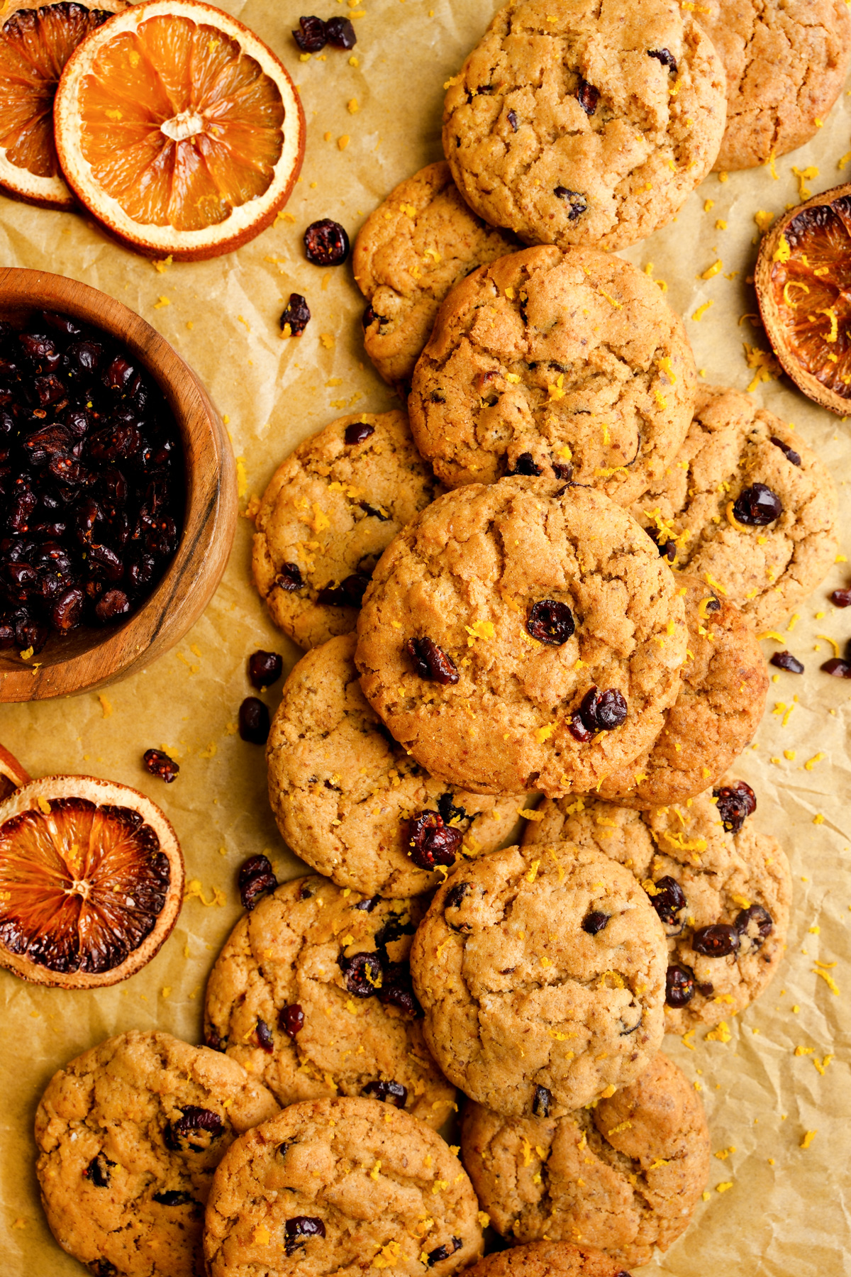 the cranberry orange cookies stacked on top of each other