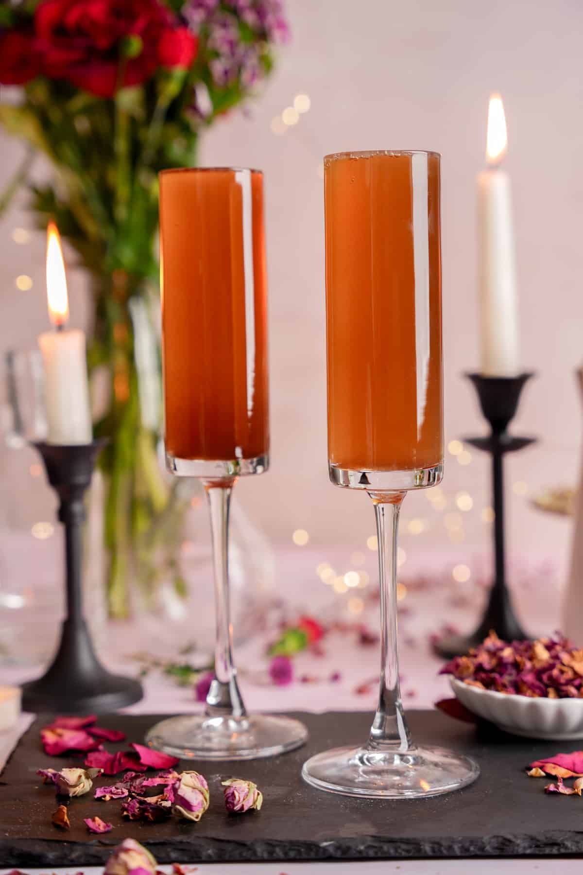 the rose mocktail in champagne glasses