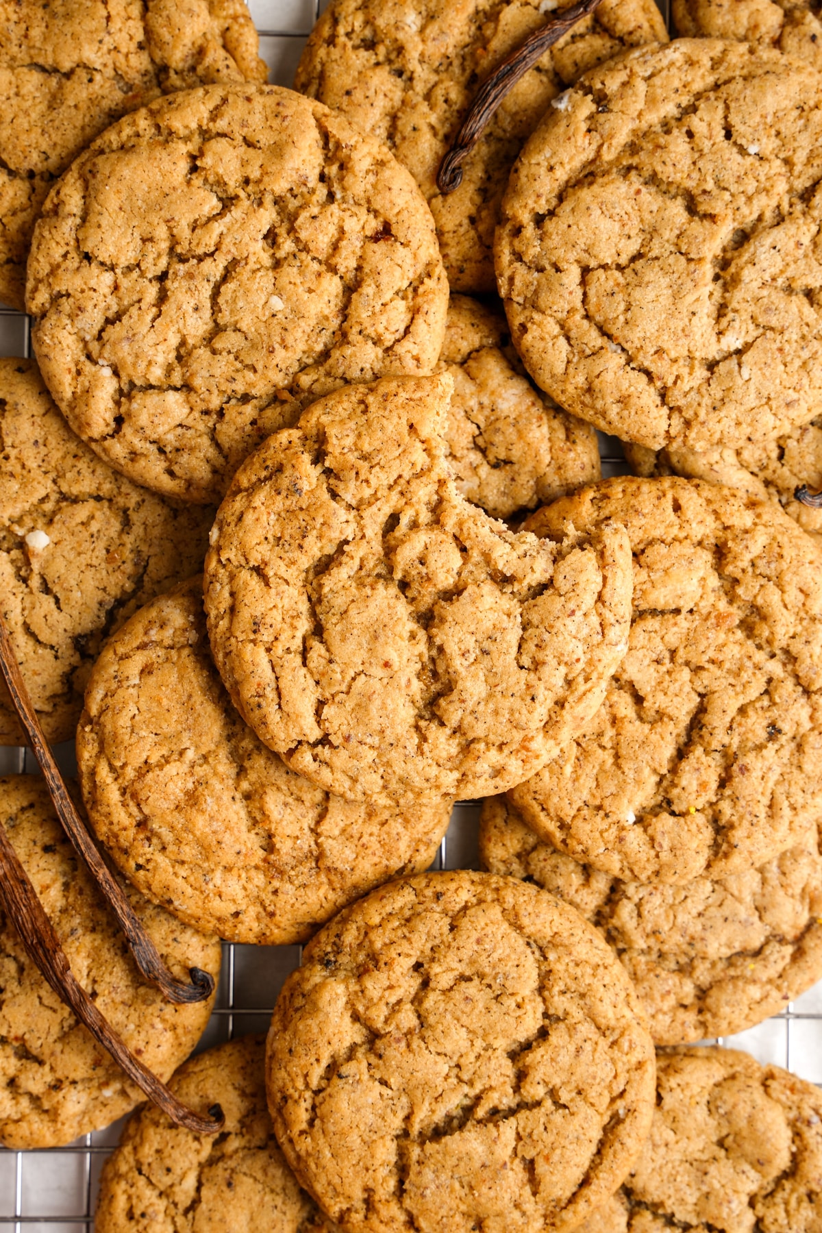 looking down at the vanilla bean cookies with a bite taken out of one