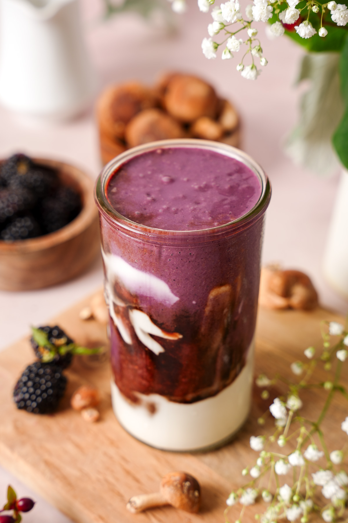 looking down at the elderberry smoothie to show the smooth creamy texture