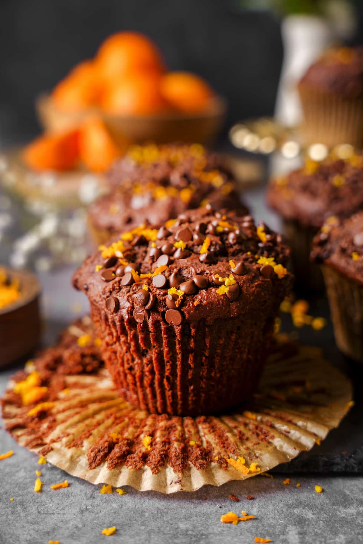 the chocolate orange muffins topped with fresh orange zest and chocolate chips