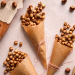 maple candied pecans in little parchment cones